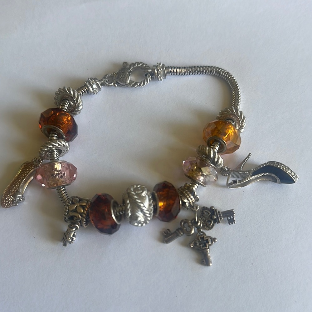 Elegant Silver and Amber Charm Bracelet